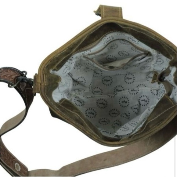 MYRA-HAZEL HUES LEATHER & HAIRON BAG
BOUTIQUE - Picture 4 of 4